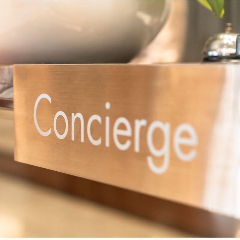 Concierge sign on a desk