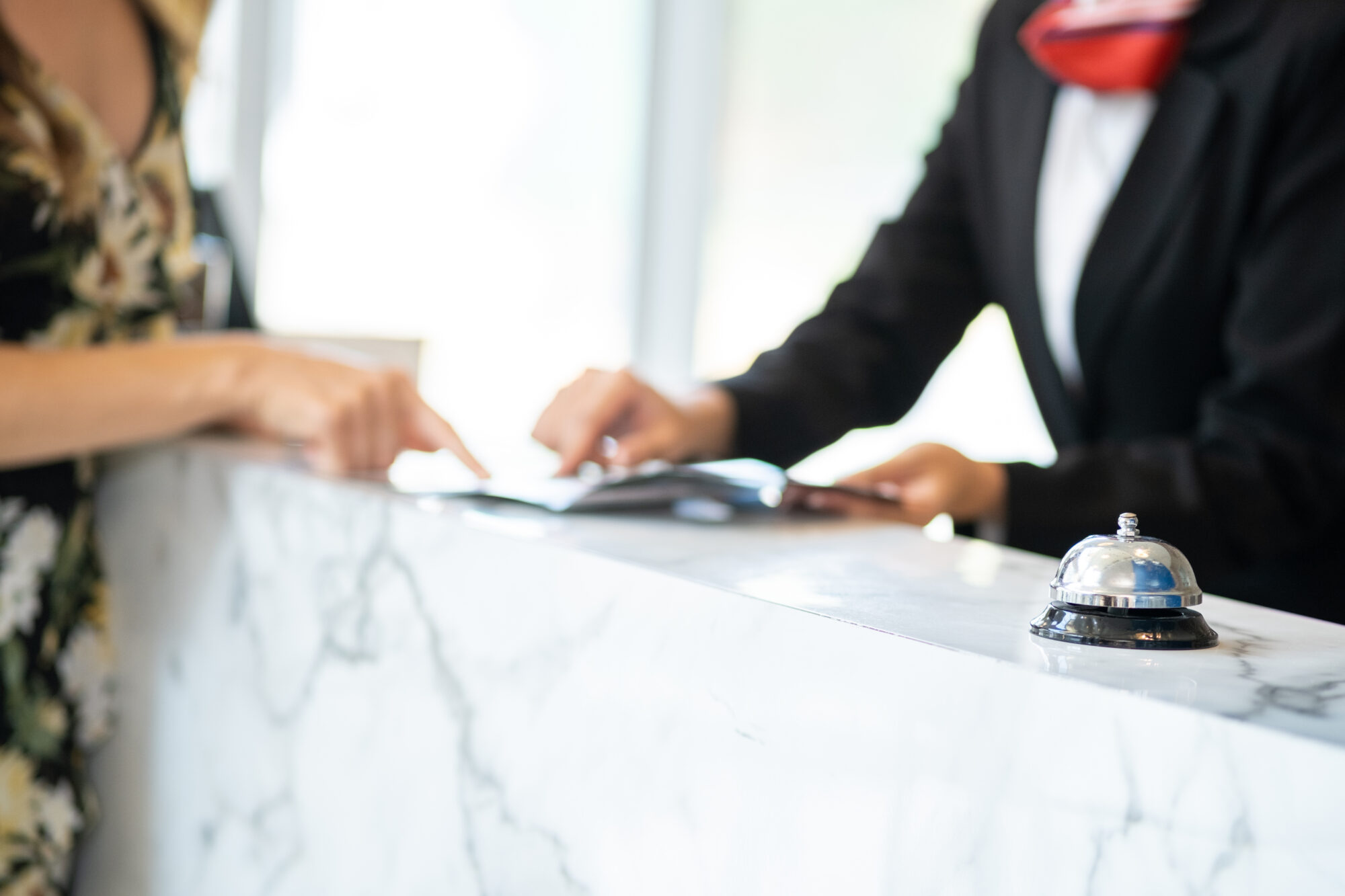 Concierge explaining to a guest